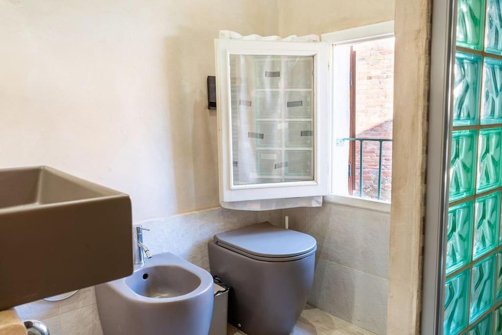 Casa Vacanze L'Angolo Fiorito Bettolle Dış mekan fotoğraf